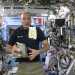 L'astronauta Luca Parmitano con il cibo preparato e impacchettato per lui dalla ditta barese Sudalimenta